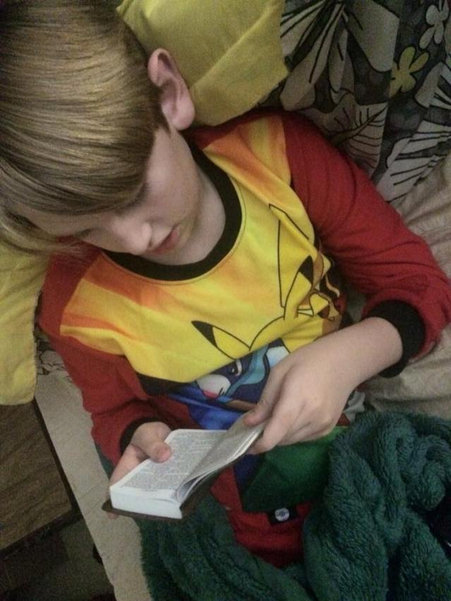 Asher Reading HIs Bible