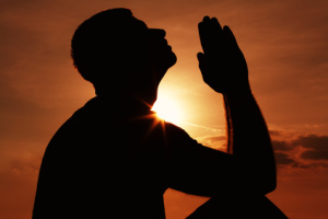 Praying man silhoutte